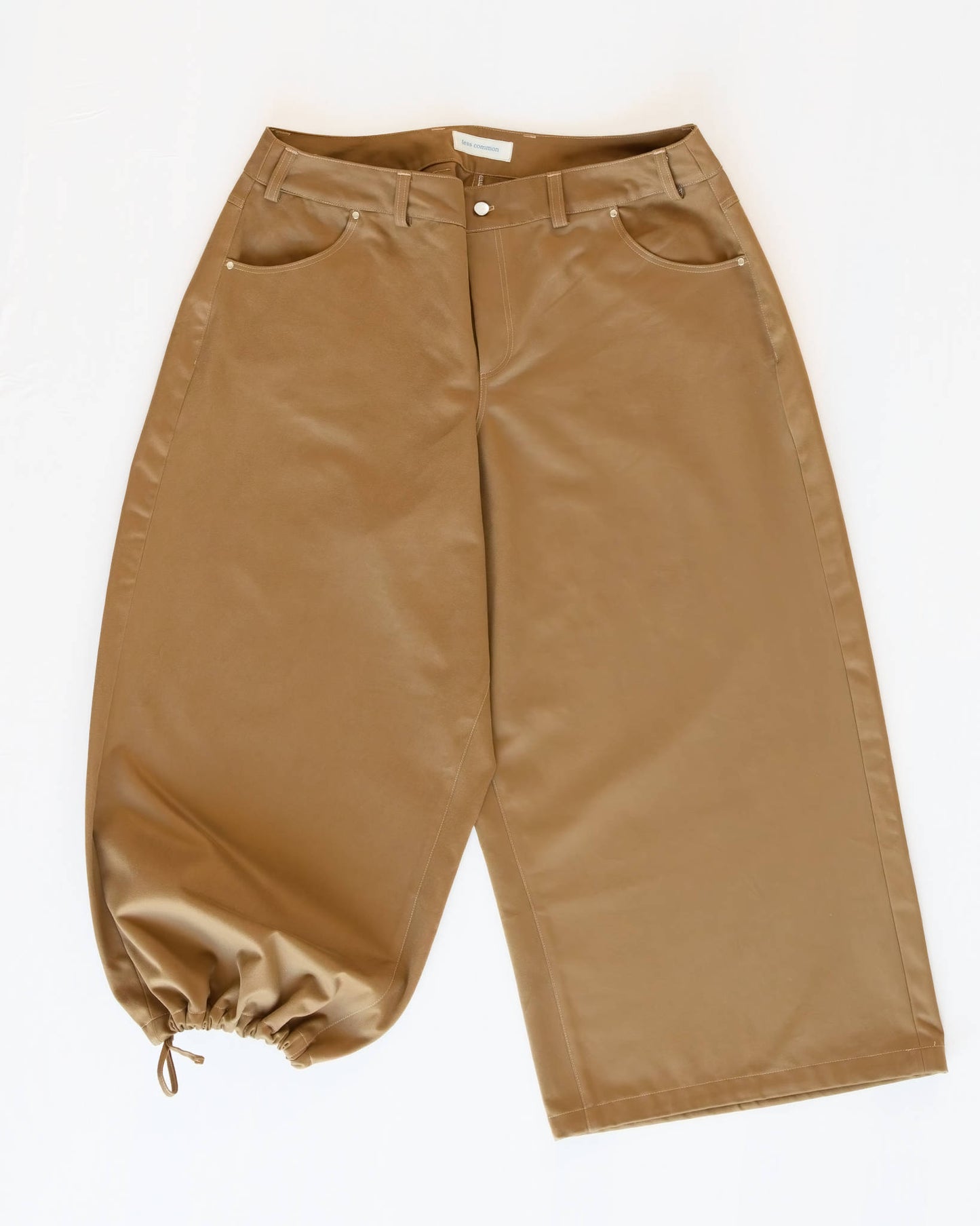 Wide-leg khaki brown jeans with drawstring cuffs on a white background