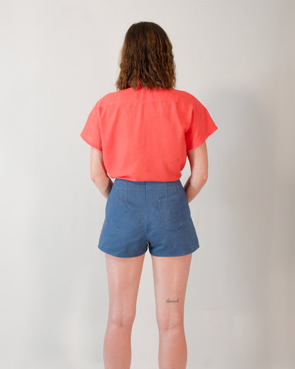 Back of Kingfisher A-line shorts in dark blue. Hidden zip closure centre-back and one back pocket on the right.