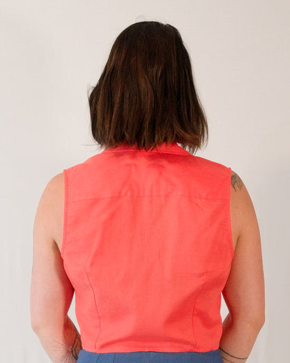 Back of sleeveless blouse in callistemon red. Back darts for shaping.