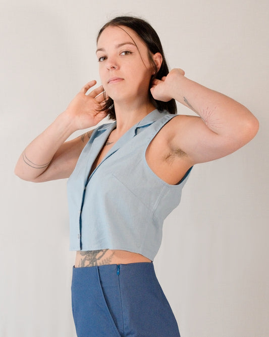 Sleeveless blouse in skyline blue styled with Kingfisher A-line shorts in blue.